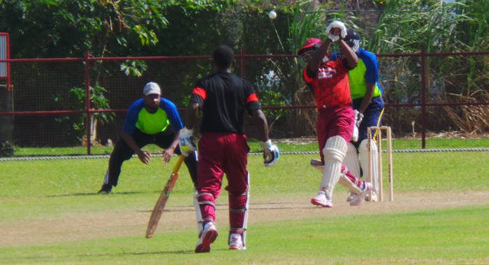 North Leeward's Ronique Laborde (89) belts another boundary.