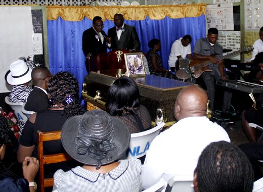 Carianne Padmore's uncle, Hailes Castello, delivers the eulogy at her funeral on Saturday. (iWN photo)