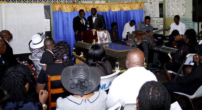 Carianne Padmore's uncle, Hailes Castello, delivers the eulogy at her funeral on Saturday. (iWN photo)
