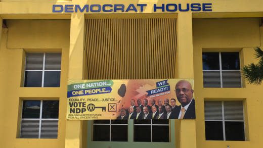 Sir James says that this billboard should be removed from outside Democrat House, the NDP's headquarters. (iWN photo)