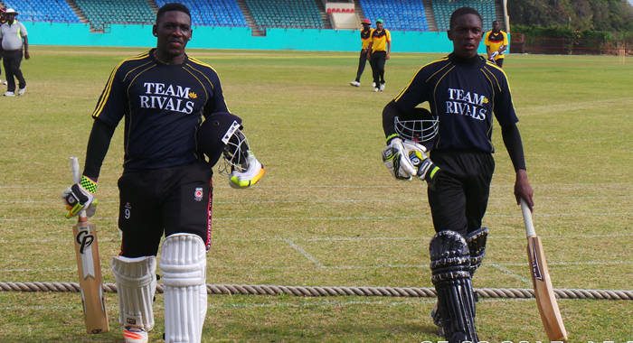 Casmond Walters 135*, left, and Dillon Douglas 43*after sharing in the 182* third wicket partnership.