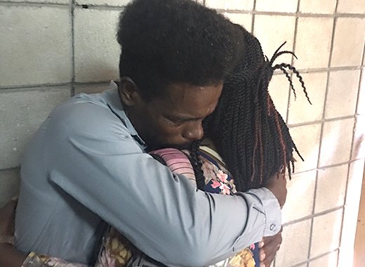 Davanan Nanton embraces his mother and cry after the Serious Offences court ruled that the has no case to answer in relation to the students' death. (iWN photo)