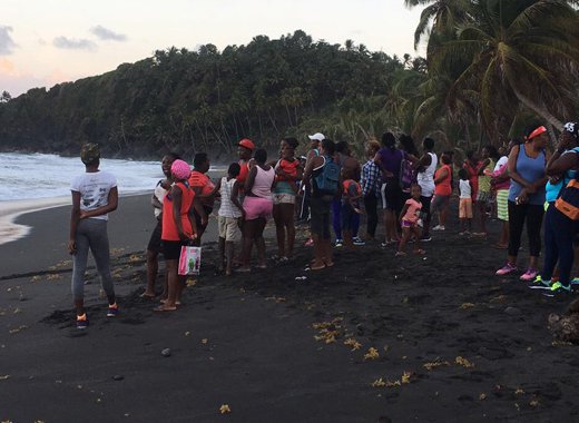 Onlookers after the drowning in Mt Young on Thursday.