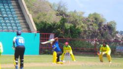 Barbadian opener Haylee Mathews driving through the covers.