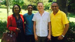 Saeed Bowman, 2nd left, pose with his parents, Roland and Lesley Bowman and Byran Adams, 2nd from right, of the SVG Preservation Fund. 