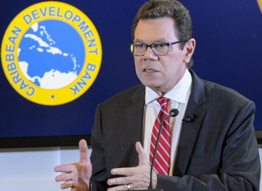 President of the Caribbean Development Bank Dr. Warren Smith says the bank is giving high priority to addressing the fallout from climate change in the region. (Credit: Desmond Brown/IPS)