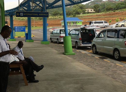 Taxi drivers wait for passengers outside AIA on Sunday. (iWN photo)