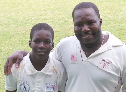 Veteran legspinner, Orlanzo Jackson, who picked up 8/32, and his son, Randy. (File photo)