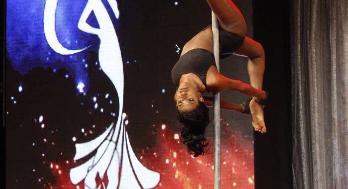 Miss SVG 2017 Jimelle Roberts shows off her pole dancing skills during Saturday's pageant. (iWN photo)