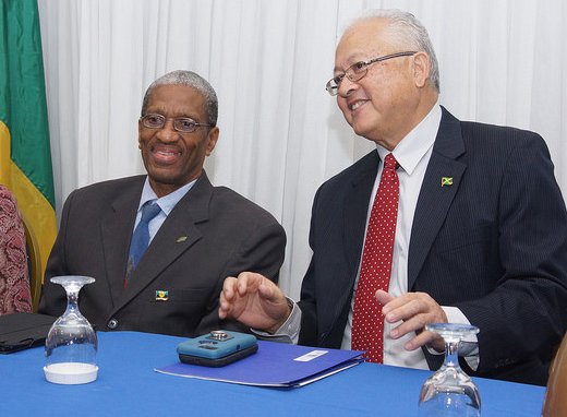 Dr. Douglas Slater, assistant secretary-general, Human and Social Development, CARICOM Secretariat, left, and Jamaicas Minister of Justice, Delroy Chuck.