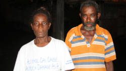Wyverine Reece, left, and Herbert Stephen, parents of the missing man, Denniston Reece. (iWN photo)