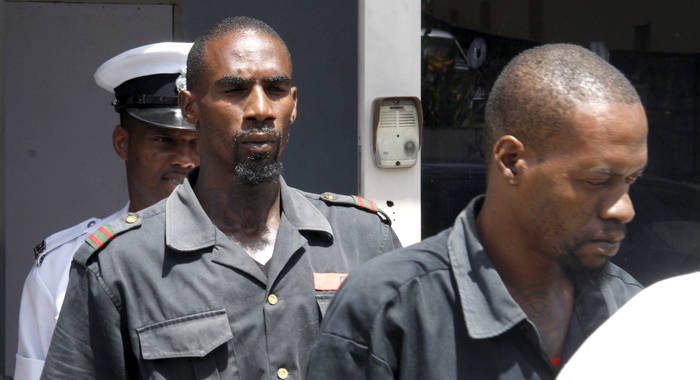 Dexter Stowe, left, and  McArthur Leach leave the Kingstown Magistrate's Court on Friday after being found guilty of cocaine possession. (iWN photo)
