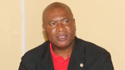 Oswald Robinson, president of the SVG Teachers' Union speaks at Tuesday's press conference. (iWN photo)