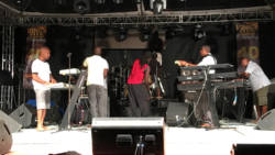 Touch sound checks at Evo 4.0 at 8:44 p.m., 44 minutes after the event was scheduled to begin. (iWN photo)