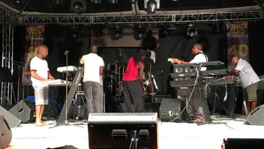 Touch sound checks at Evo 4.0 at 8:44 p.m., 44 minutes after the event was scheduled to begin. (iWN photo)