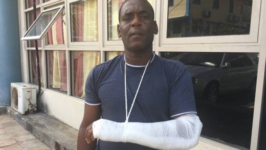 Dwight Phillips' hand was broken, allegedly when he was struck by a police officer. (iWN photo)