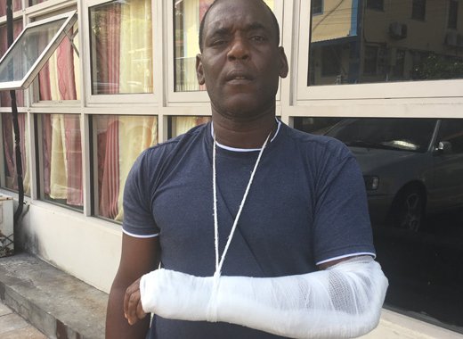 Dwight Phillips' hand was broken, allegedly when he was struck by a police officer. (iWN photo)