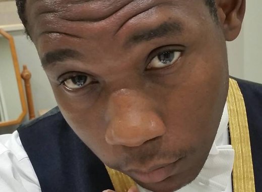 Vincentian Moriba Akeem O'Garro has accepted permanent employment at Buckingham Palace. (Photo: Facebook)