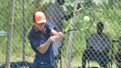 Trinidad and Tobago's Loam Sheppard on the way to a 6-4, 6-2 win over Barbados' Ward Trotman in day one Qualifiers.