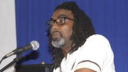 Dr. Tennyson Joseph delivers the lecture in Kingstown on Thursday. (iWN photo)