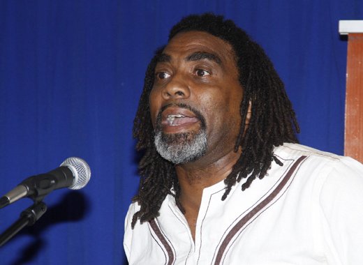 Dr. Tennyson Joseph delivers his lecture in Kingstown Thursday night. (iWN photo)