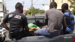 It is a common practice for police officers to ride and transport prisoners in the pan of their pickup trucks. (iWN file photo)