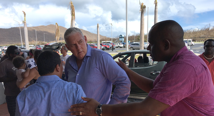 Prime Ministers Chastanet and Skeritt chat outside the airport in Tortola on Sunday CMC photo