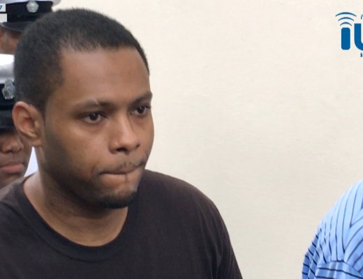 Accused murderer Veron Primus is led back to prison after Friday's court appearance. (iWN photo)
