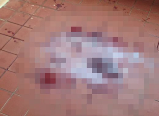 Blood inside the patio of the house after the shooting.