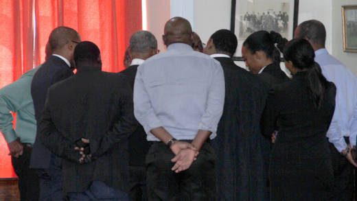 Lawyers for the NDP and the petitions in discussion during ta hearing in the matter in October 2017. (iWN photo)