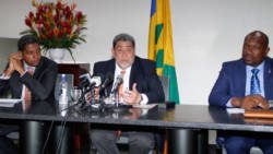 Prime Minister Dr. Ralph Gonsalves, centre, along with Camillo Gonsalves,
 right, and Saboto Caesar at a press conference last September. (iWN file photo)