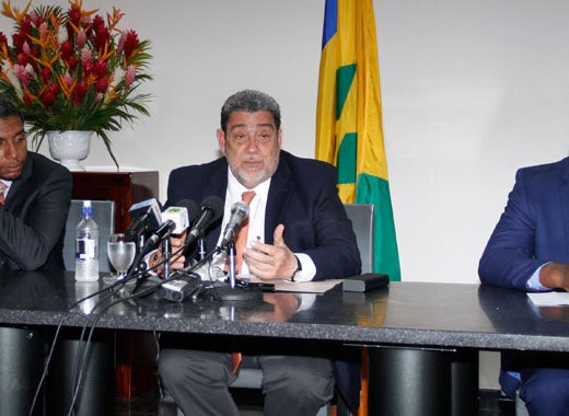 Prime Minister Dr. Ralph Gonsalves, centre, along with Camillo Gonsalves,
 right, and Saboto Caesar at a press conference last September. (iWN file photo)