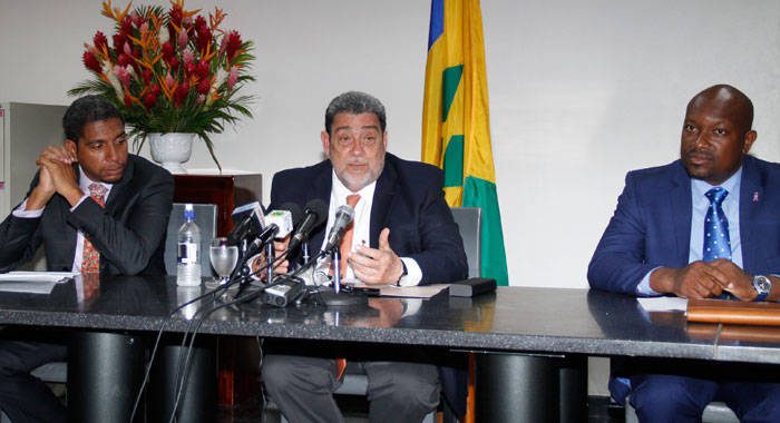 Prime Minister Dr. Ralph Gonsalves, centre, along with Camillo Gonsalves,
 right, and Saboto Caesar at a press conference last September. (iWN file photo)