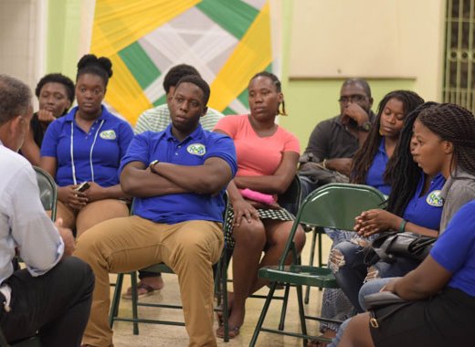 Opposition Leader Godwin Friday meets with Vincentian students in Jamaica. (Photo courtesy NDP)