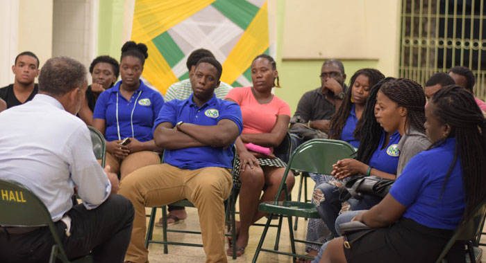 Opposition Leader Godwin Friday meets with Vincentian students in Jamaica. (Photo courtesy NDP)