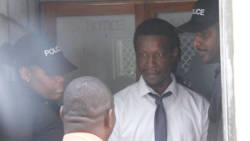 Murder accused Schemel Dunbar leave the Serious Offences Court on Monday. (iWN photo)