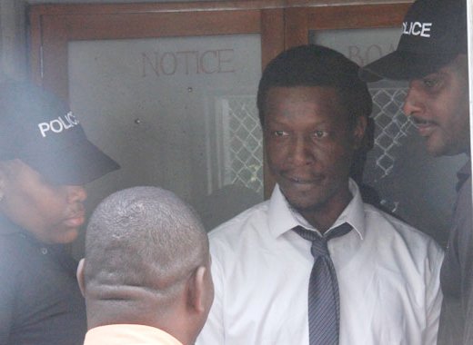 Murder accused Schemel Dunbar leave the Serious Offences Court on Monday. (iWN photo)
