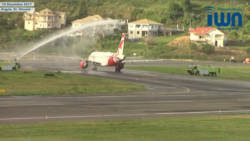 The traditional water salute at AIA as Air Canada Rouge arrives for its inaugural flight to St. Vincent on Dec. 14, 2017. (iWN photo)