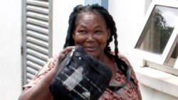 Corlita Charles leaves the Serious Offences Court on Monday, after paying the first $1,000 of her fine. (iWN photo)