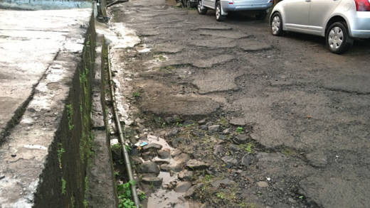 Diamonds residents were on Christmas Day more willing to talk about the state of their roads, than the shooting death of a fellow villager. (iWN photo)