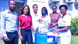 Students hands over medical supplies