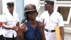 Yugge Farrell gestures as she leaves the Kingstown Magistrate's Court on Friday, Jan. 5. (iWN photo)
