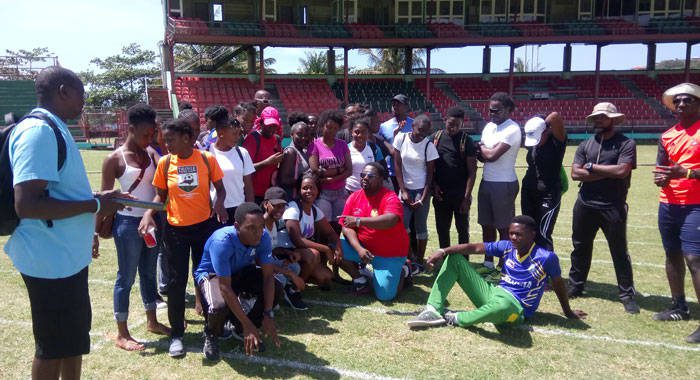 IAAF Technical Instructor, Woodrow Williams, left, and Philcol Jeffers, centre front row, discussing issues with participants