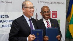 SVG's Minister of Foreign Affairs, Sir Louis Straker, right, and his Taiwan counterpart, David Lee at Thursday's signing ceremony. (iWN photo)