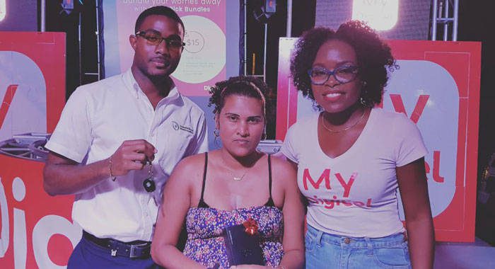 From left: Grand prize winner Anthony George, the other finalists, Kerisha Bullock and Digicels Marketing Executive, Jamisha Wright.
