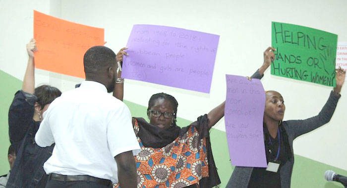 Protesters inside the lecture hall in Barbados. (Photo: Barbados TODAY)