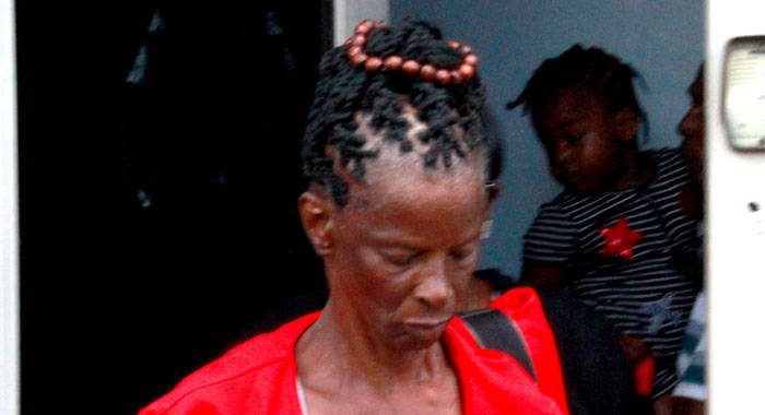 The defendant, Thotelyn Wilson leaves the Kingstown Magistrate Court on Monday after pleading guilty to a child abuse charge. (iWN photo)