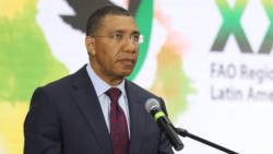 Prime Minister of Jamiaica, Andrew Holness, speaking at the event on  Wednesday. (FAO photo)