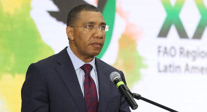 Prime Minister of Jamiaica, Andrew Holness, speaking at the event on  Wednesday. (FAO photo)