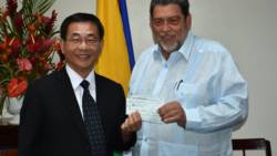 Ambassador Ger, left, and Prime Minister Ralph Gonsalves. (Photo: Lance Neverson/Facebook)